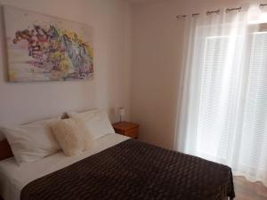 Posteľ alebo postele v izbe v ubytovaní Cozy apartments Neda near the sea