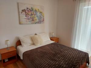 Posteľ alebo postele v izbe v ubytovaní Cozy apartments Neda near the sea