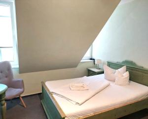Postel nebo postele na pokoji v ubytování Hotel Villa Weststrand