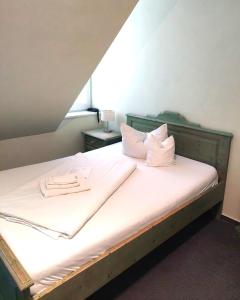 Postel nebo postele na pokoji v ubytování Hotel Villa Weststrand