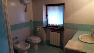 Kylpyhuone majoituspaikassa Casa Vacanze Le Corone