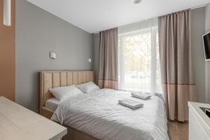 Postel nebo postele na pokoji v ubytování Hotel 24 7