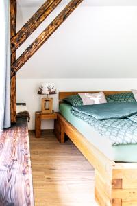 Postel nebo postele na pokoji v ubytování Feuerlehof Appartement
