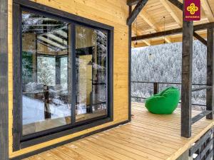 Το «Yo Hill» - «Йо Хілл» - Будинок в горах τον χειμώνα