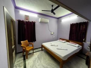 Postel nebo postele na pokoji v ubytování Annai - Home stay 3BHK