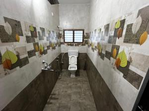 Koupelna v ubytování Annai - Home stay 3BHK + 11 fotografií