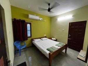 Postel nebo postele na pokoji v ubytování Annai - Home stay 3BHK