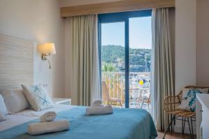 Postel nebo postele na pokoji v ubytování Hotel Miramar
