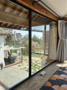 Balkón nebo terasa v ubytování Kunming Mountain Wowo Hefeng Dieyuan B&B