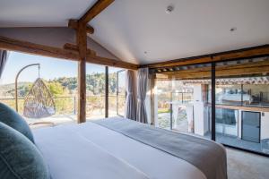 Postel nebo postele na pokoji v ubytování Kunming Mountain Wowo Hefeng Dieyuan B&B