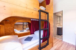Habitación con litera en una casa en Les Chambres d'hôtes Val de Tamié, en Faverges