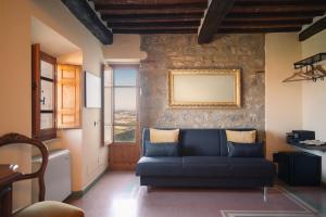 Posezení v ubytování Rocca d'Orcia Suites and Villas