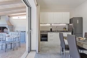 Kuchyň nebo kuchyňský kout v ubytování Casa Ginepro + 5 fotografií