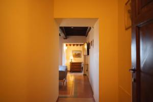 Postel nebo postele na pokoji v ubytování Rocca d'Orcia Suites and Villas