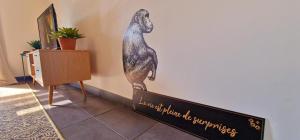 TV a/nebo společenská místnost v ubytování Appt Perle de Corail face au lagon de St-Leu