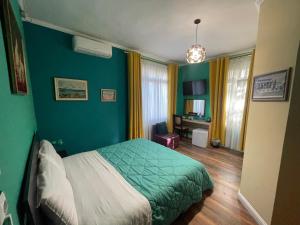 Postel nebo postele na pokoji v ubytování HOTEL VILA 15 - CENTER