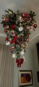 a christmas tree is hanging from a ceiling at B&B DieMme Amalfi Coast in Vietri sul Mare