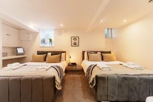 Enjoy Leeds at 4BR House - Near City Centreにあるベッド