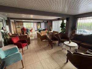Posezení v ubytování Figen Suite Hotel 2