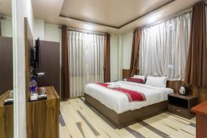 Letto o letti in una camera di The SR Hotel