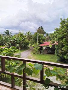 a view from the balcony of a house at Teratak Yoi in Pantai Cenang
