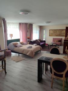 Postel nebo postele na pokoji v ubytování Gite Luxury à Soultzeren