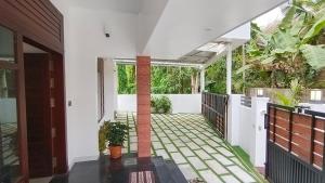 Kuchyň nebo kuchyňský kout v ubytování Theeram Guesthouse