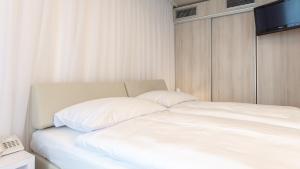 Posteľ alebo postele v izbe v ubytovaní VacationClub - Ultra Marine Apartament 53