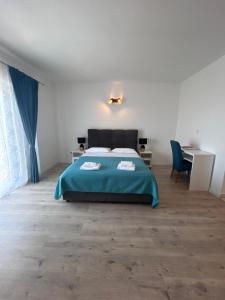Postel nebo postele na pokoji v ubytování Apartmani Velnic 2