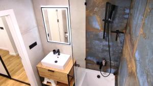 Koupelna v ubytování Tiché Anenské Apartmány s hotelovým servisem a s kvalitní snídaní na apartmán - by Relax Harrachov