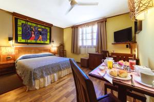 Μια τηλεόραση ή/και κέντρο ψυχαγωγίας στο Hotel Chalet des Roses