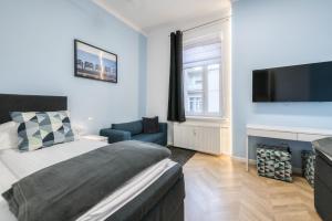 Televízia a/alebo spoločenská miestnosť v ubytovaní DR Apartments - Nicea