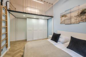 Posteľ alebo postele v izbe v ubytovaní DR Apartments - Nicea