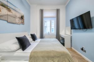 Posteľ alebo postele v izbe v ubytovaní DR Apartments - Nicea