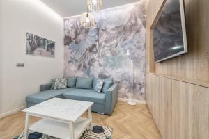 Televízia a/alebo spoločenská miestnosť v ubytovaní DR Apartments - Nicea