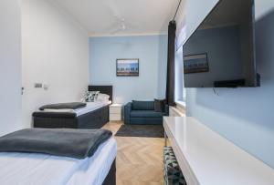 Posteľ alebo postele v izbe v ubytovaní DR Apartments - Nicea