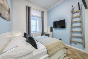 Televízia a/alebo spoločenská miestnosť v ubytovaní DR Apartments - Nicea