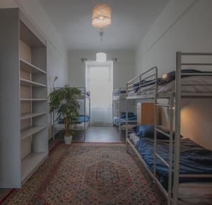 Rúm í herbergi á IN hostel Prague