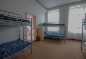 Rúm í herbergi á IN hostel Prague