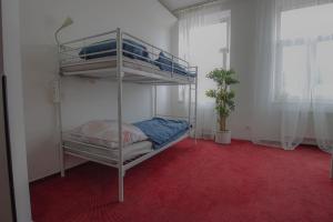Rúm í herbergi á IN hostel Prague