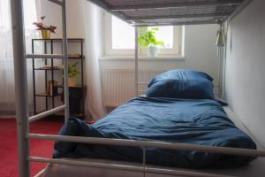 Rúm í herbergi á IN hostel Prague