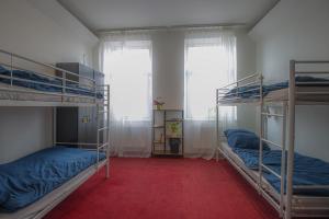 Rúm í herbergi á IN hostel Prague