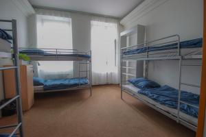 Rúm í herbergi á IN hostel Prague