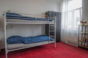 Rúm í herbergi á IN hostel Prague