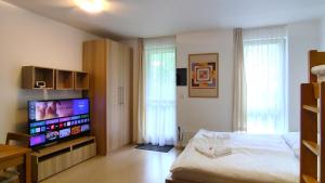 Postel nebo postele na pokoji v ubytování Tiché Anenské Apartmány s hotelovým servisem a s kvalitní snídaní na apartmán - by Relax Harrachov