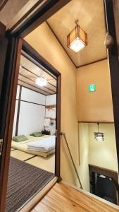 Postel nebo postele na pokoji v ubytování Bighem Maison 2