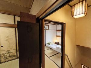 Postel nebo postele na pokoji v ubytování Bighem Maison 2