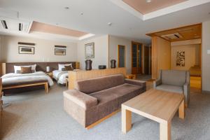 Postel nebo postele na pokoji v ubytování Nasu Kasumigajo Hotel & Resort + 37 fotografií