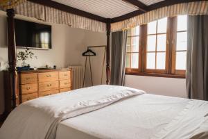 Scratch House Hotel Boutique客房内的一张或多张床位