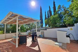 Un patio o zona al aire libre en La Perla Andaluza